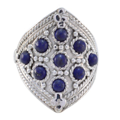 Liyana heritage blue gemstone ring with intricate silver detailing and seven blue stones