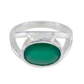 Emma heritage green gemstone ring with oval green stone set in polished silver band