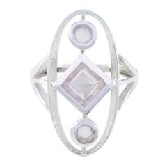 Lucia abstract pink gemstone ring with diamond and circular stones set in silver oval frame
