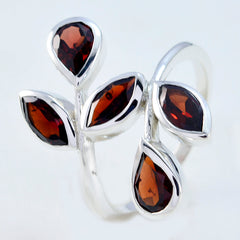 Saanvi abstract red gemstone ring with silver band and multiple red gemstones in leaf shapes