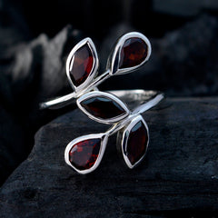 Saanvi silver ring featuring an abstract red gemstone ring with five teardrop-shaped red stones