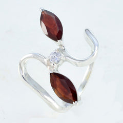 Lili abstract red gemstone ring with two marquise red stones and a clear center gem on silver band