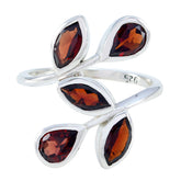 Saanvi silver abstract red gemstone ring with five teardrop-shaped red stones in an artistic design
