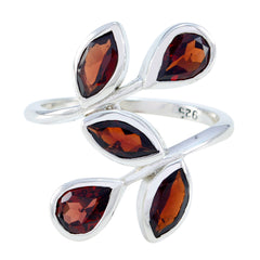 Saanvi silver abstract red gemstone ring with five teardrop-shaped red stones in an artistic design