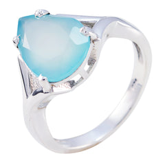 Teresa aqua solitaire ring for wedding with a polished silver band and heart-shaped blue gemstone