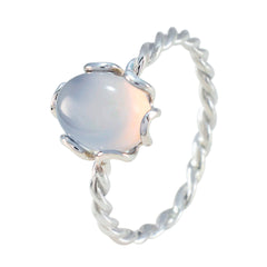 Putri aqua solitaire ring with twisted silver band and polished oval aqua gemstone