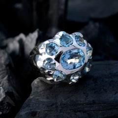 Maya artisan blue gemstone ring with multiple blue stones set in a silver band