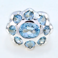 Maya artisan blue gemstone ring featuring multiple faceted blue stones set in polished silver band