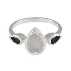 Kristine artisan trilogy ring silver band with pear moonstone center and two black teardrop side stones
