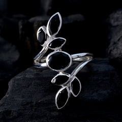 Lucy black leaf ring for women with silver band and multiple black stones shaped like leaves