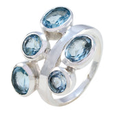 Silver Mila blue gemstone penta ring with five faceted blue stones in modern cluster design
