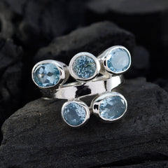 Mila five stone silver ring with faceted aquamarine gems on open band blue gemstone penta ring