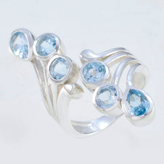 Putri silver blue gemstone statement ring with multiple round and teardrop blue stones