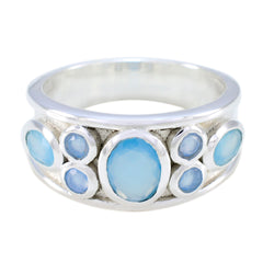 Isabelle blue gemstone statement ring with multiple oval blue stones set in silver band