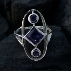 Siti blue gemstone trilogy ring with three dark blue stones set in silver metal