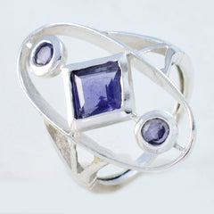 Siti blue gemstone trilogy ring with silver band and three faceted blue stones