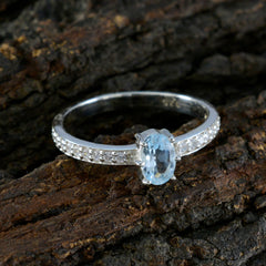 Eun-ji blue halo ring for women with oval blue gemstone and diamond-encrusted silver band