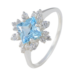 Riya Blue Halo Ring with Sparkling Gemstones