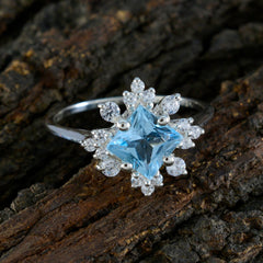 Riya Blue Halo Ring with Sparkling Gemstones