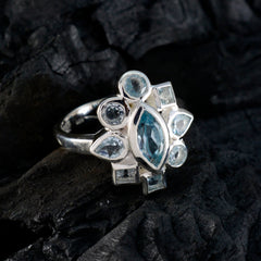 Lucy blue navratna ring with marquise and round blue gemstones set in silver band