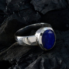 Chloe blue solitaire ring for women with a deep blue gemstone set in polished silver band