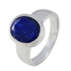 Chloe blue solitaire ring for women with a deep blue faceted stone set in silver band