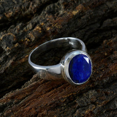 Chloe blue solitaire ring for women with a deep blue gemstone set in a silver band