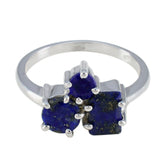 Noelia blue trilogy ring for women with three deep blue stones set in silver band