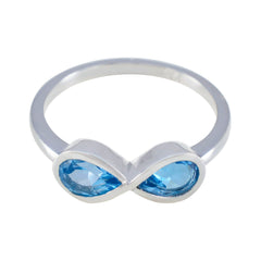 Siti boho blue gemstone ring with infinity design and teardrop blue stones in silver band