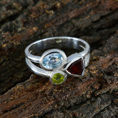 Maya boho multicolor gemstone ring sterling silver with blue oval red triangle and green round stones on bark