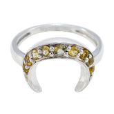 Nari boho yellow gemstone ring with silver crescent-shaped band and multiple yellow stones