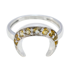 Nari boho yellow gemstone ring with silver crescent-shaped band and multiple yellow stones