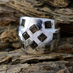 Julia silver wide band brown gemstone statement ring with square smoky brown gems on rustic wood