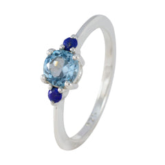 Lili silver ring with round light blue center stone and two small dark blue accents colorful stackable rings for women