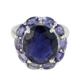 Lucia contemporary blue gemstone ring with large central stone surrounded by smaller oval blue gemstones