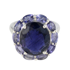 Lucia contemporary blue gemstone ring with large central stone surrounded by smaller oval blue gemstones