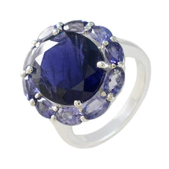 Lucia contemporary blue gemstone ring featuring a large central blue stone surrounded by smaller blue gemstones