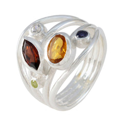 Laura contemporary multicolor gemstone ring with yellow, red, blue, green, and clear stones in silver setting