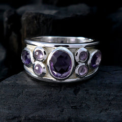 Meera sterling silver contemporary purple gemstone ring with central oval amethyst and six accent stones
