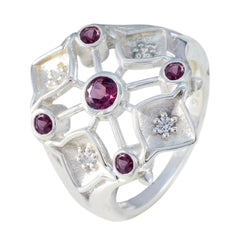 Emily contemporary red gemstone ring with silver intricate lattice design and multiple red stones