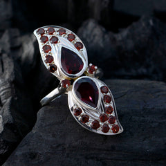 Natcha contemporary red gemstone ring with dual pear shaped garnets and pave round stones on silver