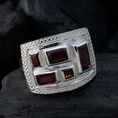 Hazel contemporary red gemstone ring featuring geometric rectangular red stones set in textured sterling silver