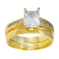 Ayesha gold wedding set with large rectangular solitaire and channel set side stones contemporary white stone ring