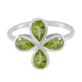 Liyana silver ring with four pear shaped peridot stones arranged as a floral clover green gemstone floral ring