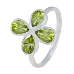 Liyana sterling silver ring with four pear peridot stones arranged as a flower green gemstone floral ring