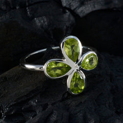 Liyana green gemstone floral ring sterling silver band with four pear shaped peridot petals and polished finish