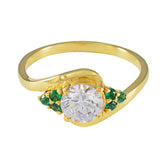 Araya gold twisted band ring with round clear center stone and emerald side accents green gemstone romantic ring