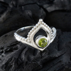 Eun-ji Stylish Green Solitaire Ring with Silver Detail