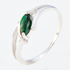 Hye-jin elegant green solitaire ring with marquise-cut green gemstone set in silver band