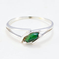 Hye-jin green solitaire ring featuring a marquise shaped green stone set in a silver band